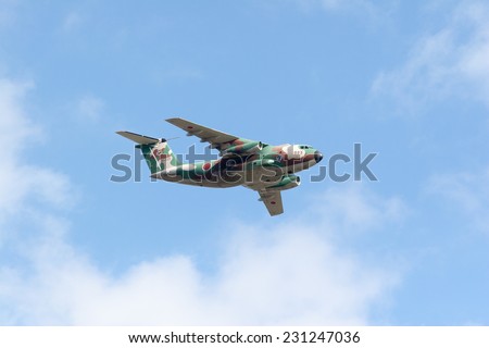SAITAMA, JAPAN - NOVEMBER 3, 2014: Japanese Air Self-Defense Force holds their annual airshow at their Iruma airbase. They have a demonstration flight by a military cargo airplane called C-1.