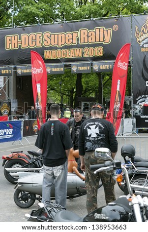 WROCLAW, POLAND - MAY 18: Harley Davidson motorcycle riders in front of the gate \