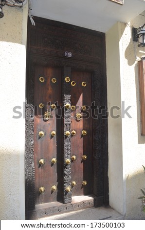 STONE TOWN, ZANZIBAR - DECEMBER 12: Door of the house in which Freddy Mercury lived in Zanzibar on 12 December 2013 in Stone Town, Tanzania.