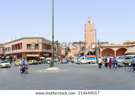 MARRAKESH, MOROCCO - AUGUST 24: Tourists visiting Marrakesh\'s medina quarter on 24 August 2014 in Marrakesh, Morocco.