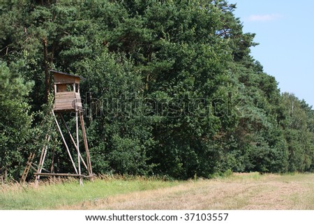http://image.shutterstock.com/display_pic_with_logo/215950/215950,1253022311,3/stock-photo-hunting-tower-in-the-forest-37103557.jpg