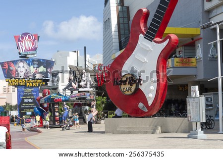 CANCUN - JANUARY 22: View of the Hard Rock Cafe on Main Street on 22 January 2015 in Cancun, Mexico. In this street is a lot of clubs and restaurants for tourists from all over the world..