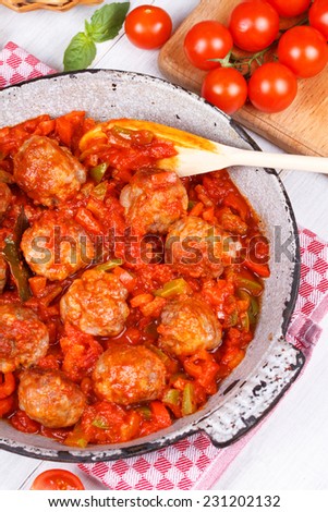 Meatballs with tomato sauce in a pan