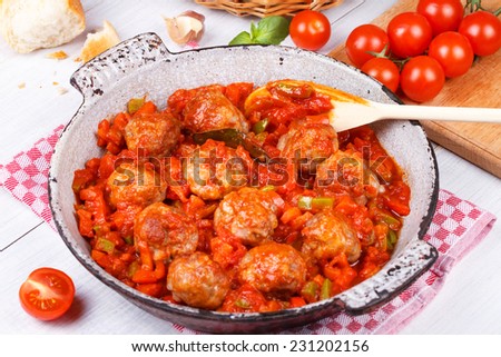 Meatballs with tomato sauce in a pan