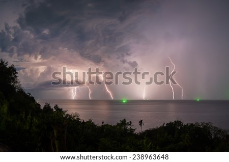 Lightning in the sea during the night storm