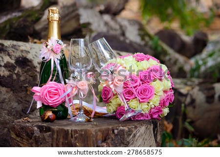 Wedding, bridal bouquet and wine glasses