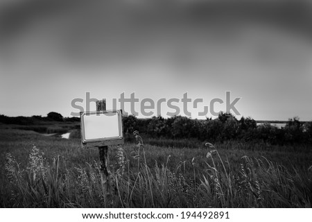 black and white blank signpost in the nature countryside, can write what you want, custom