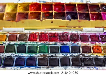 Watercolor paint set, close-up with shallow depth of field