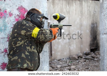 Guy with a paintball gun