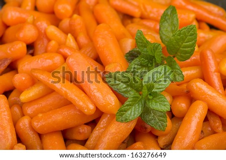 Small carrots cooked with olive oil and spices