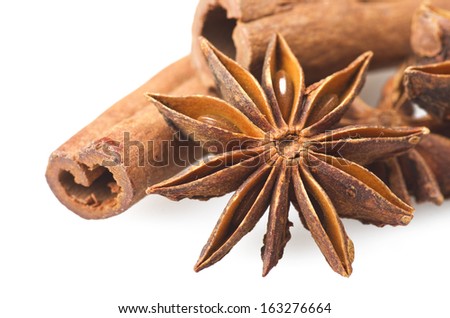 Cinnamon sticks and star anise close up on the white