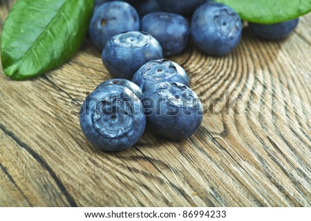 blueberries close up on a wood table