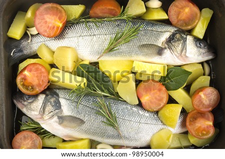 sea bass cooked with vegetable