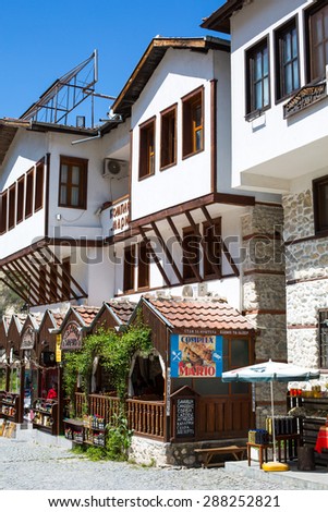 Melnik, Bulgaria - April 15, 2015: Traditional stone built house with mehana - traditional restaurant at the first floor in Melnik town, Bulgaria