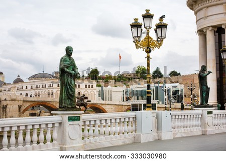Skopje, Macedonia - September, 30, 2015: Part of National archaeological museum, street light and statue at Skopje Eye Bridge