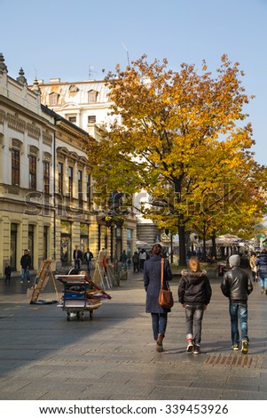 Belgrade, Serbia - November, 2, 2014: The old street Skadarlija in Belgrade, Serbia, people, yellow autumn trees