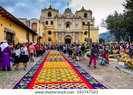 LA MERCED CHURCH ANTIGUA GUATEMALA APRIL 1 2007 Holy Week carpet or alfombra made in the path of a religious procession using wooden stencils and dyed sawdust LA MERCED CHURCH ANTIGUA GUATEMALA APRIL 1 2007 Holy Week carpet or alfombra made in the path of a religious procession using wooden stencils and dyed sawdust