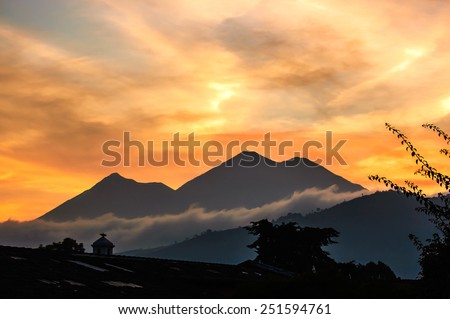 Sunset view of Fuego & Acatenango volcanoes near Antigua, Guatemala, Central America