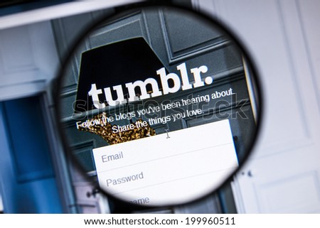 Ostersund, Sweden - June 21, 2014: Close up of tumblr website under a magnifying glass.Tumblr is a microblogging platform and a social networking website