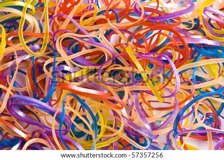 Colorful rubber bands background closeup