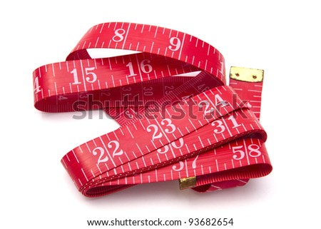 Red tape measure closeup on white background