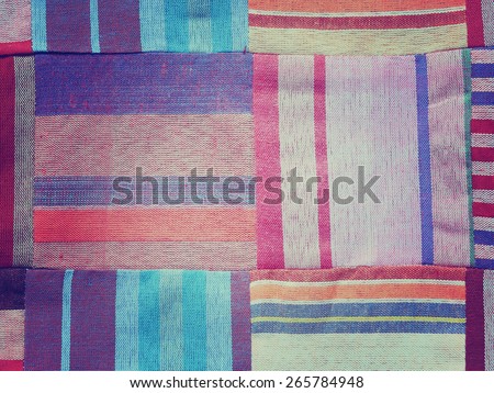 Colorful textile background with vintage filter