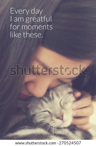 Inspirational quote & Young woman hug the cat blurred background with vintage filter