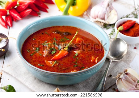 Goulash, beef, tomato, pepper, chili, smoked paprika soup. Traditional Hungarian dish.