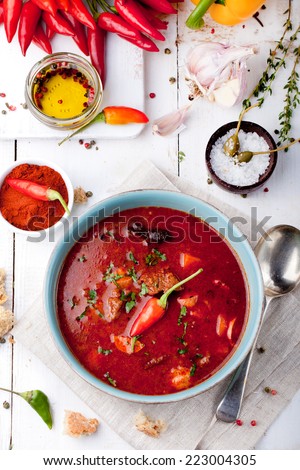 Goulash, beef, tomato, pepper, chili, smoked paprika soup. Traditional Hungarian dish.