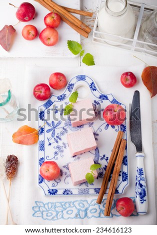 Apple paste, pastille, zephyr, marshmallow with cinnamon on a white background