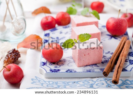 Apple paste, pastille, zephyr, marshmallow with cinnamon on a white background