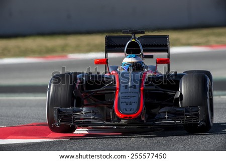 BARCELONA - FEBRUARY 22: Fernando Alonso of McLaren Honda at fourth day of Formula One Test Days at Catalunya Circuit on February 22, 2015 in Barcelona, Spain.