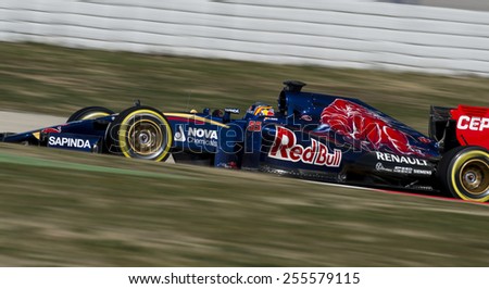 BARCELONA - FEBRUARY 22: Carlos Sainz of Toro Rosso at fourth day of Formula One Test Days at Catalunya Circuit on February 22, 2015 in Barcelona, Spain.