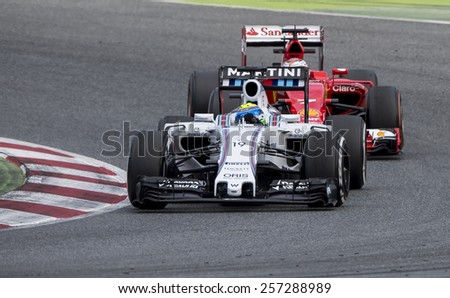 BARCELONA - FEBRUARY 28: Felipe Massa and Kimi Raikkonen at third day of Formula One Test Days at Catalunya Circuit on February 28, 2015 in Barcelona, Spain.