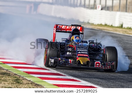 BARCELONA - FEBRUARY 28: Carlos Sainz of Toro Rosso at third day of Formula One Test Days at Catalunya Circuit on February 28, 2015 in Barcelona, Spain.