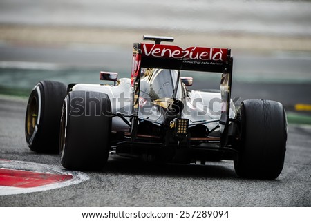 BARCELONA - FEBRUARY 26: Romain Grosjean of Lotus at first day of Formula One Test Days at Catalunya Circuit on February 26, 2015 in Barcelona, Spain.