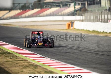 BARCELONA - FEBRUARY 26: Carlos Sainz of Toro Rosso at first day of Formula One Test Days at Catalunya Circuit on February 26, 2015 in Barcelona, Spain.