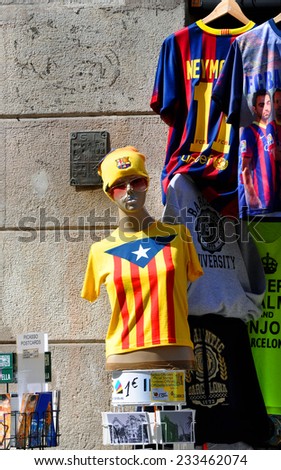 BARCELONA - MAR 08:  Mannequin in a T-shirt with the flag of Catalonia and gift shop on March 08. 2014 in Barcelona, Spain