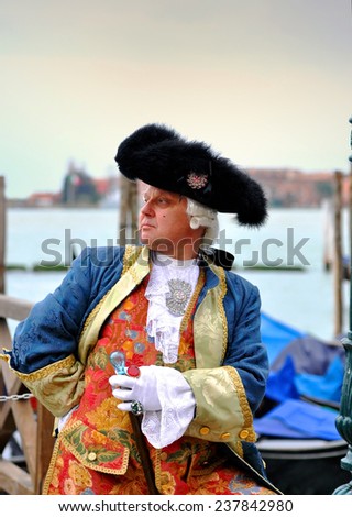 VENICE - MAR 02: A man dressed as a rich man during the Venice Carnival on March 02.2014 in Venice, Italy