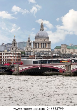LONDON - MAY 15: City of London view from the London bridge. St. Paul cathedral in London on May 15.2014 in England