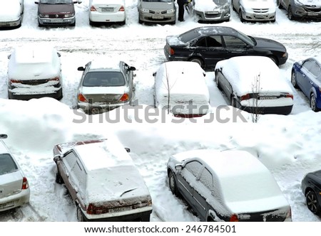 MOSCOW - JAN 25: Parked cars after winter blizzard in Moscow on January 25.2015 in Russia