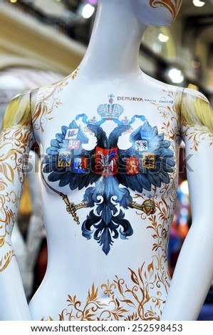 MOSCOW - FEB 14: Mannequin with different authors design at the GUM - Moscow fashion store at the Red square on February 14.2015 in Russia