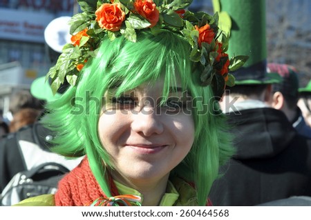 MOSCOW - MAR 14: Smiling girl with green hair during St Patrick\'s day party in Moscow on March 14. 2015 in Russia