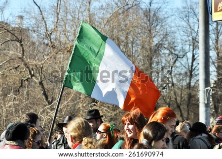 MOSCOW - MAR 14: Crowd of people with Irish flag during St Patrick\'s day party in Moscow on March 14. 2015 in Russia