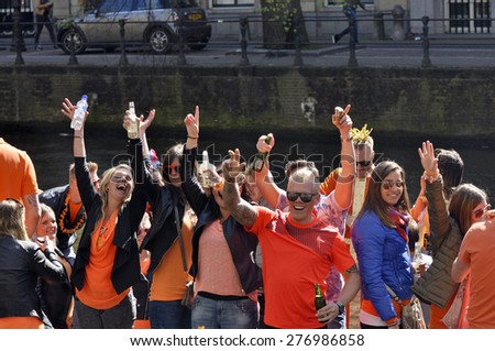 AMSTERDAM APR 27: The crowd of teenagers at the party during celebration Queensday in Amsterdam on April 27. 2015 in Holland