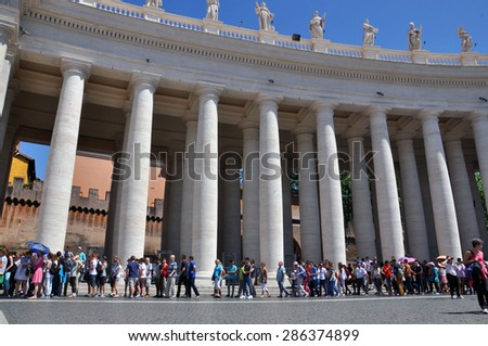 VATICAN - MAY 07: Long lines of tourists and believers in Vatican City on May 07. 2015 in Italy.