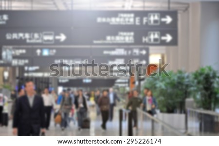 Passenger in the Shanghai airport.Interior of the airport - blurred effect
