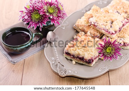 Blackberry pie and coffee cup