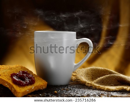 rusks jam and steaming hot coffee