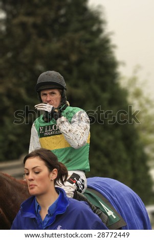 CHELTENHAM, GLOUCS, APRIL 17 2009: Champion Jockey AP Tony McCoy rides back Al Co from the end of the second race at the April National Hunt Meeting at Cheltenham Racecourse, UK